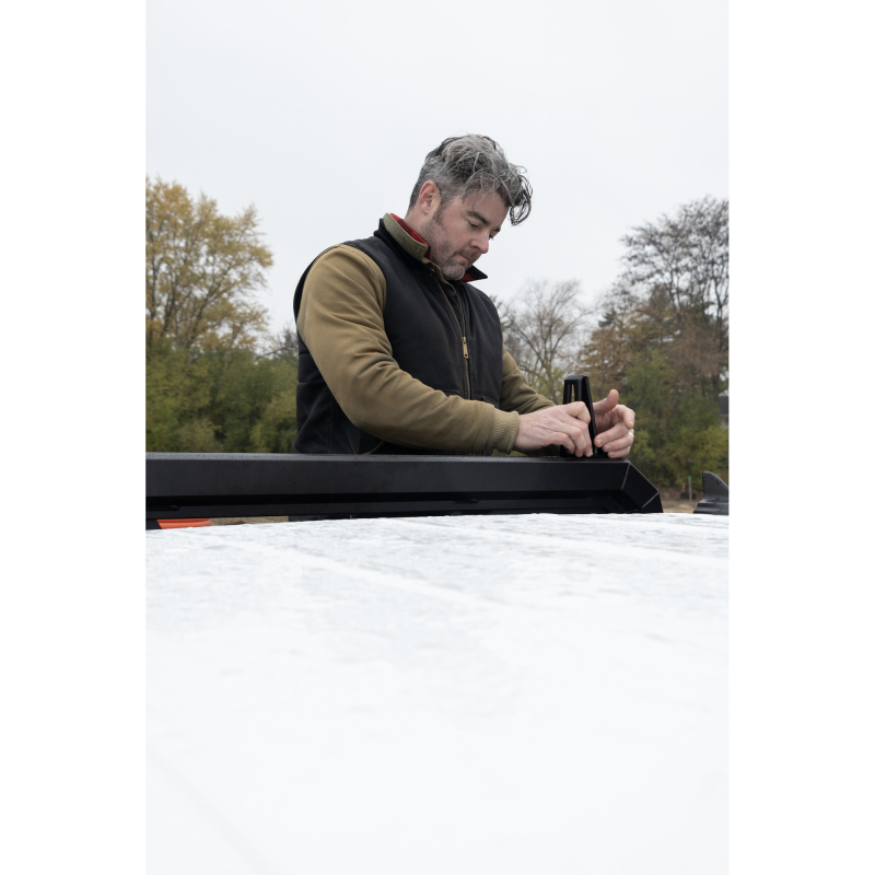 Installing cargo stops on a Weather Guard Louvered Headache Rack