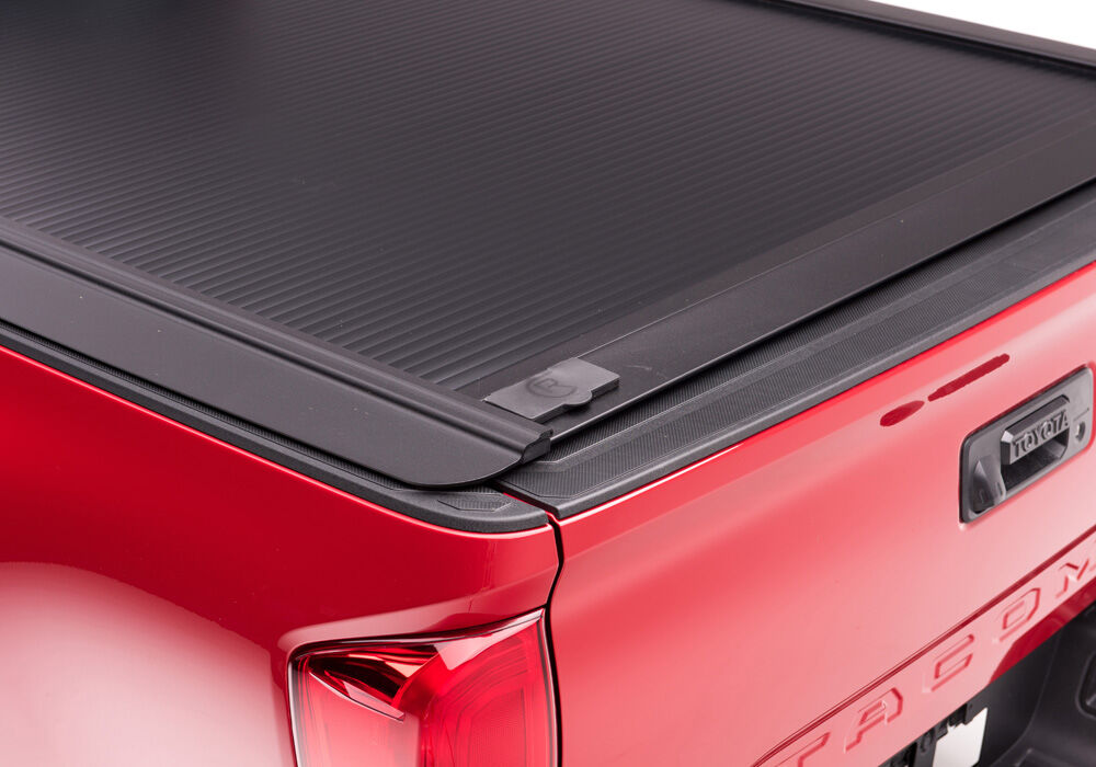 RetraxOne MX Retractable Tonneau Cover - Matte One Piece Polycarbonate Finish - 2016-2023 Toyota Tacoma Double Cab 5' Bed without Stake Pockets without Trail Special Edition Storage Boxes