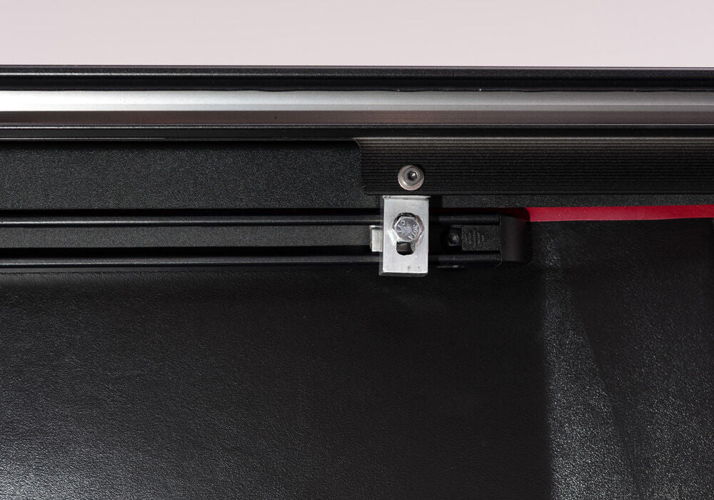 RetraxOne MX Retractable Tonneau Cover - Matte One Piece Polycarbonate Finish - 2007-2021 Toyota Tundra CrewMax 5' 6" Bed with Deck Rail System without Stake Pockets without Trail Special Edition Storage Boxes