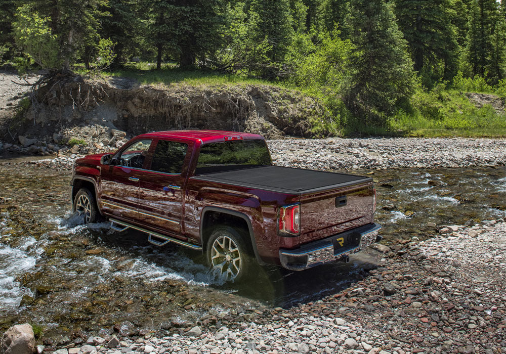 RetraxOne MX Retractable Tonneau Cover - Matte One Piece Polycarbonate Finish - 2007-2021 Toyota Tundra CrewMax 5' 6" Bed with Deck Rail System without Stake Pockets without Trail Special Edition Storage Boxes