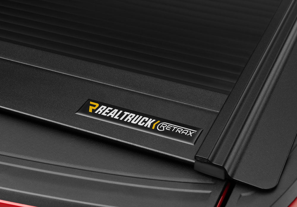 RetraxOne MX Retractable Tonneau Cover - Matte One Piece Polycarbonate Finish - 2019 (New Body Style)-2026 Chevy Silverado/GMC Sierra 1500 6' 7" Bed without Stake Pockets - Standard Rails