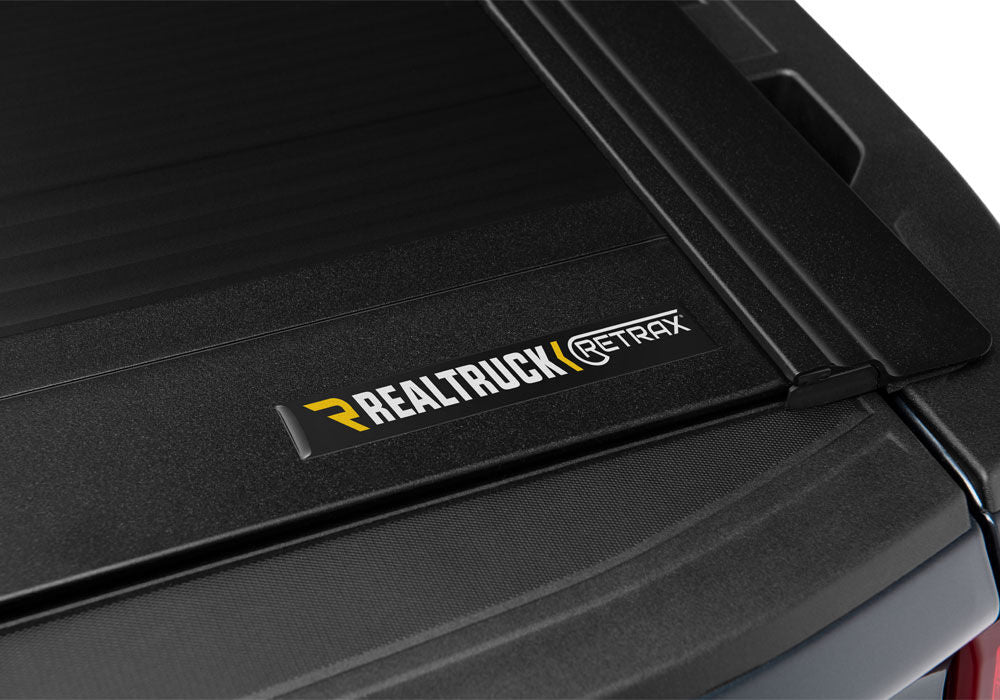 RetraxOne MX Retractable Tonneau Cover - Matte One Piece Polycarbonate Finish - 2020-2027 Chevy Silverado/GMC Sierra 2500 HD/3500 HD 6' 9" Bed without Stake Pockets - Standard Rails