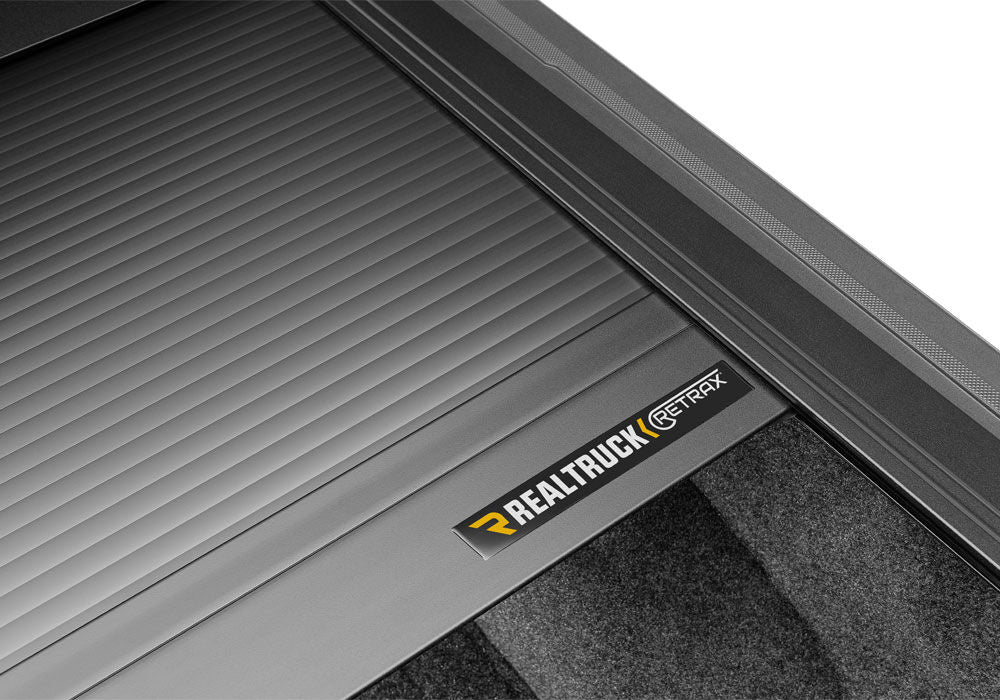RetraxOne MX Retractable Tonneau Cover - Matte One Piece Polycarbonate Finish - 2021-2027 Ford F-150 5' 7" Bed (Includes Lightning) without Stake Pockets