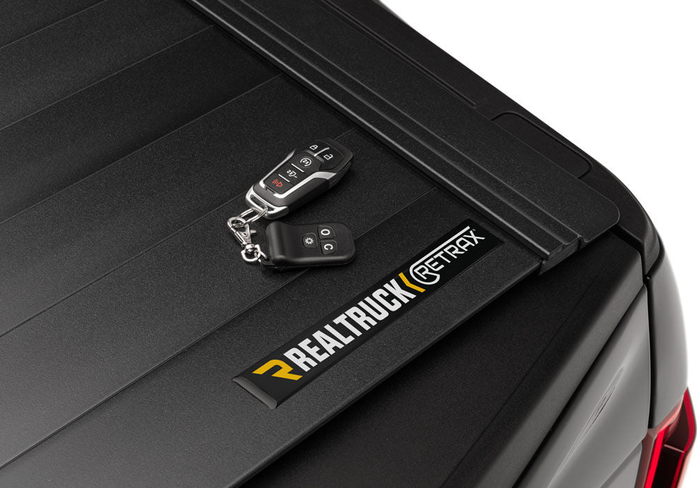 PowertraxPRO MX Retractable Tonneau Cover - Rugged - Aluminum Construction - Electric Cover - Matte Black - 2019-2027 (New Body Style) Ram 5' 7" Bed without RamBox without Multifunction Tailgate without Stake Pockets
