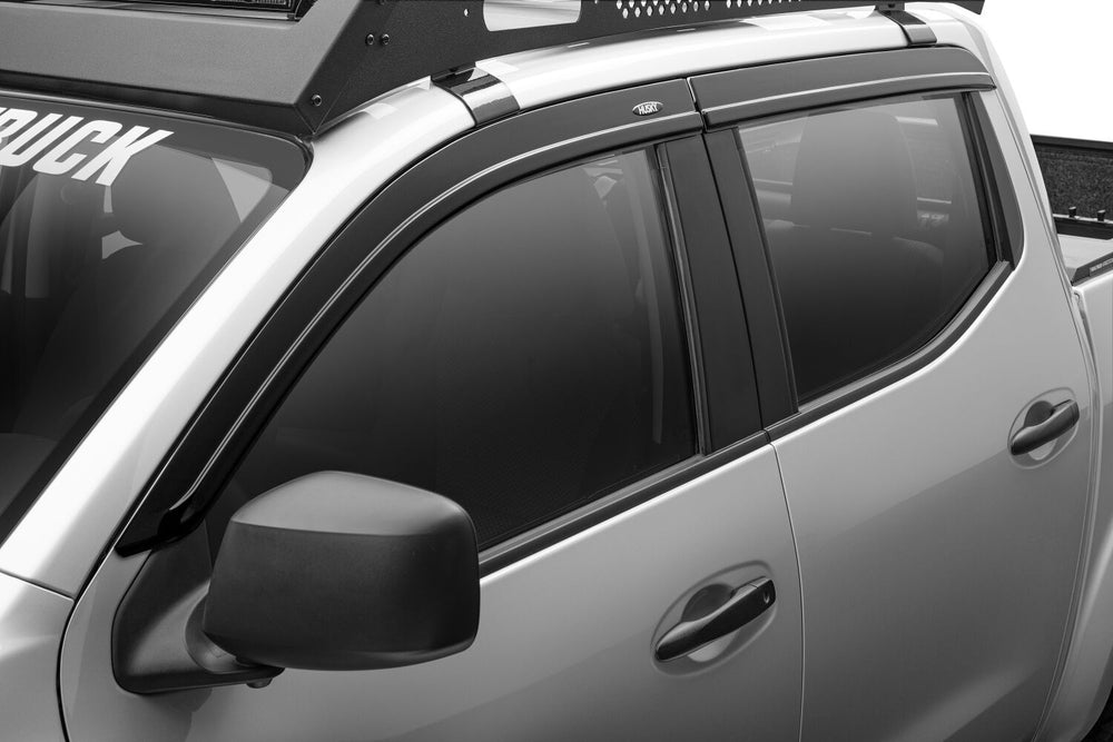 Husky Liners Low Profile Ventvisor Deflector; Smoke; Outside Mount; 4 pc. INTERNATIONAL - 2014-2026 Nissan NP300 / 2016-2020 Nissan NP300 Frontier - Part 2854113